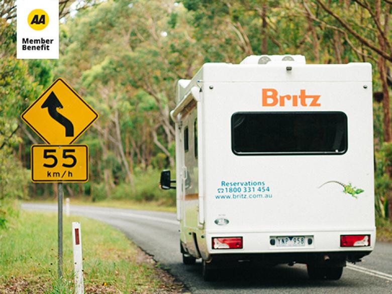 Britz camervan driving along a rural road