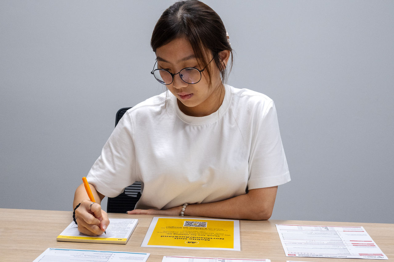 young woman filling out a form