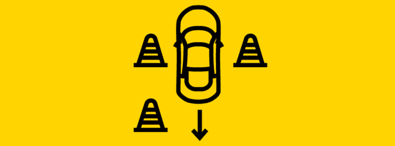 A simple black icon on a bright yellow background shows a top-down outline of a car positioned between three traffic cones, with one cone on each side and one in front. An arrow beneath the car points downward, suggesting reversing or maneuvering the vehicle within a controlled space, such as a parking or driving test scenario.
