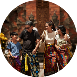 Family laughing and walking together in Southeast Asia