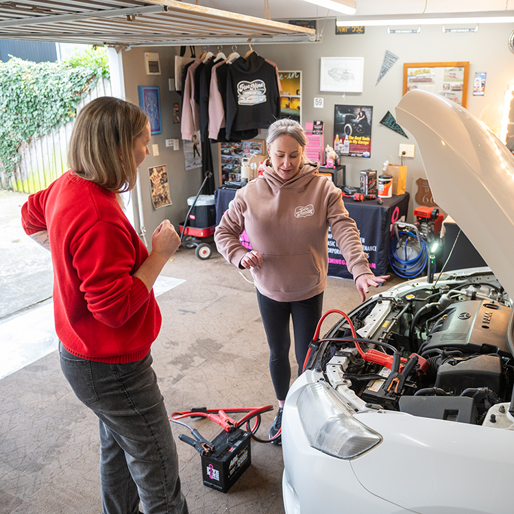 Melissa explains why it's important to know how to properly jumpstart a car. Photo by Jim Huang.