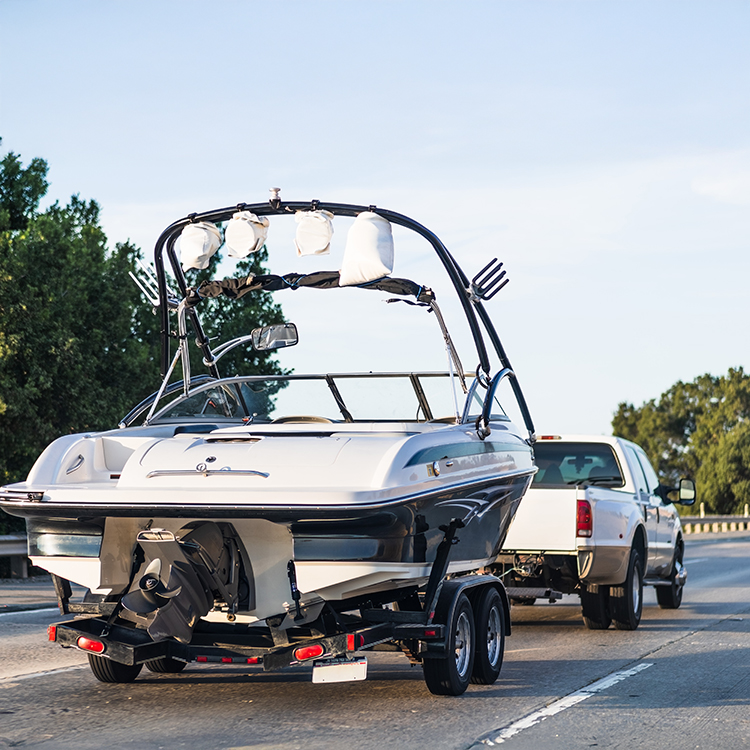 Getting stuck behind a towing vehicle can be frustrating. 