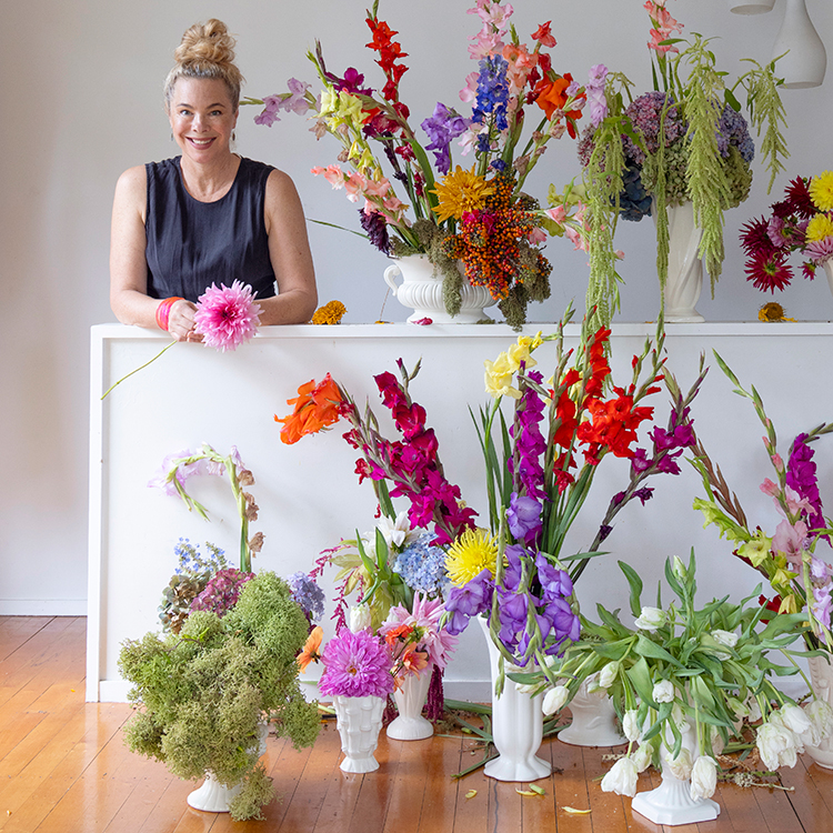 Emma Bass with some of her beautiful floral arrangements. 