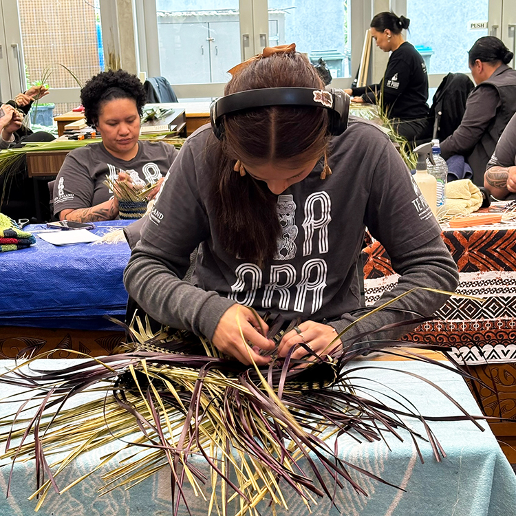 Students learn traditional Māori crafts at the National School of Weaving at Te Puia. Photo by Jo Percival.