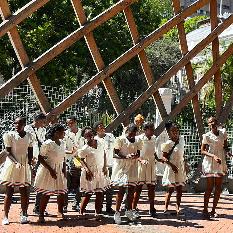 An acapella choir performs on the street in Cape Town. Photo by Jacqui Gibson.