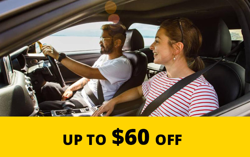 Young couple in the front seats of a car