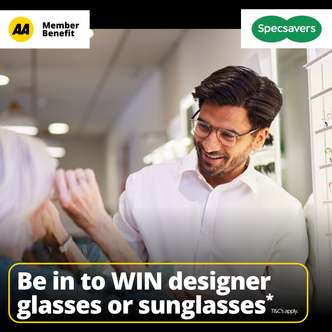 Man helping person with glasses